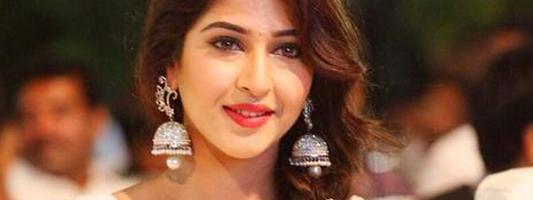 Sonarika Bhadoria New Latest HD Photos in White Dress at Jadoogadu Audio Launch Event Function